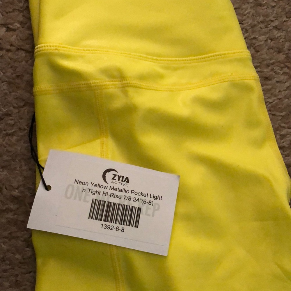Zyia neon yellow leggings size 6-8 brand Never been worn, still have tags on